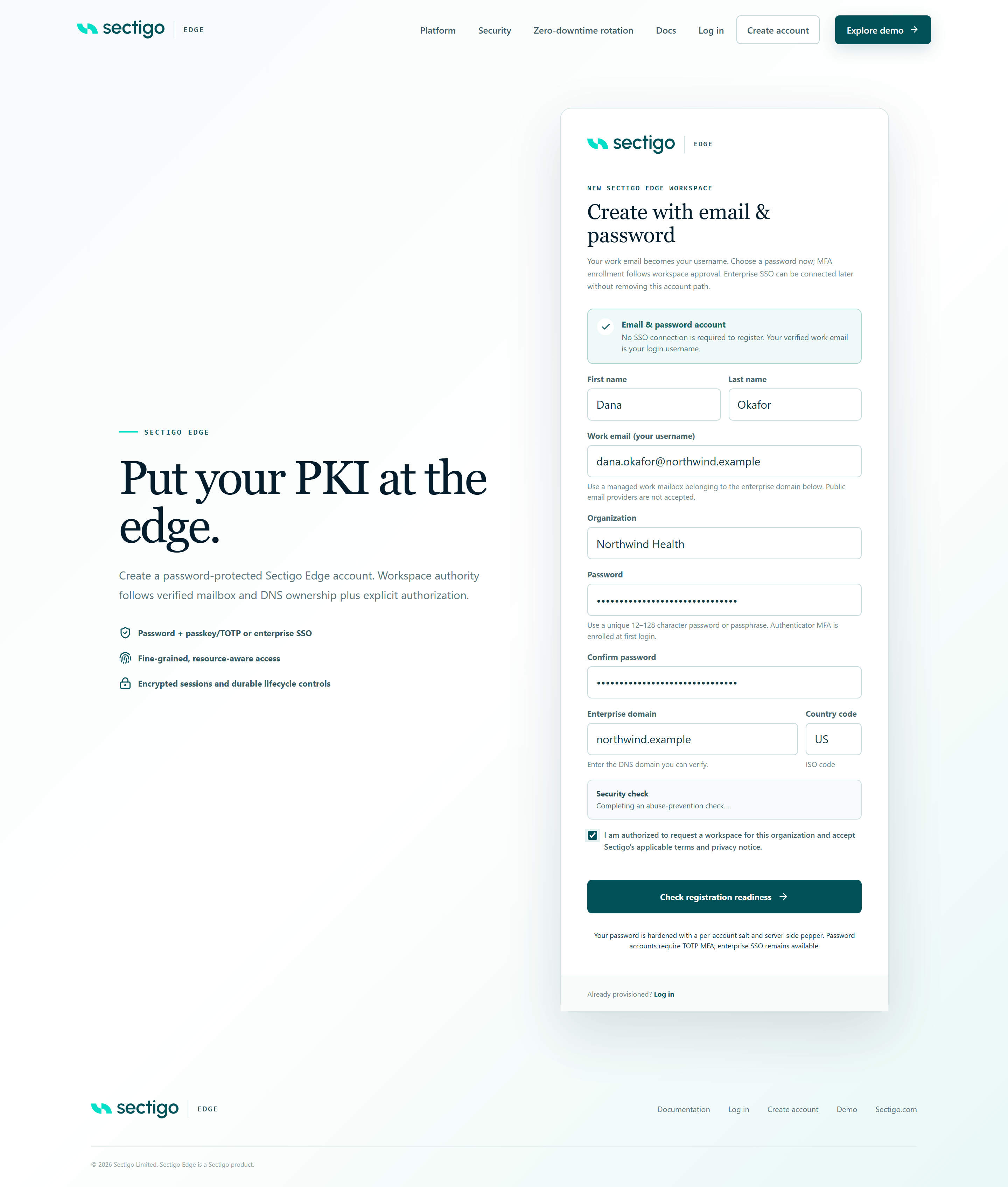 The Create with email and password form completed with first and last name, a work email, organization, password, enterprise domain, country code US, a completed security check and the consent checkbox ticked